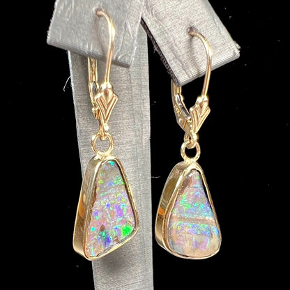 A pair of Australian boulder opal dangle earrings.