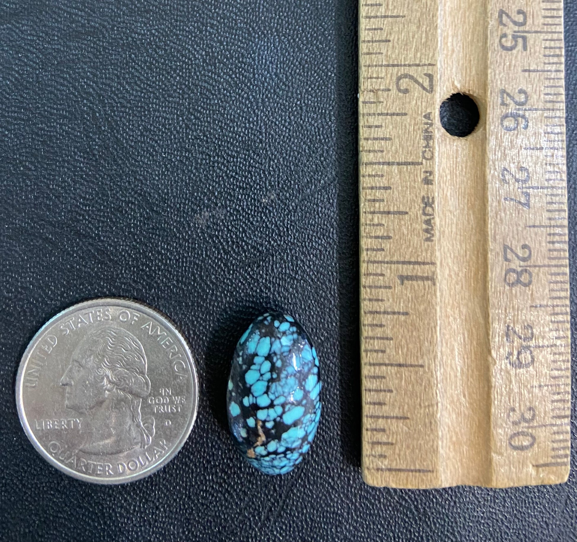 A black spiderweb turquoise stone from Nevada.