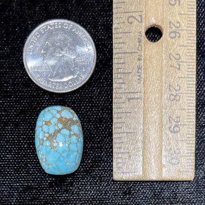 A loose spiderweb turquoise stone from Number 8 Mine, Nevada.