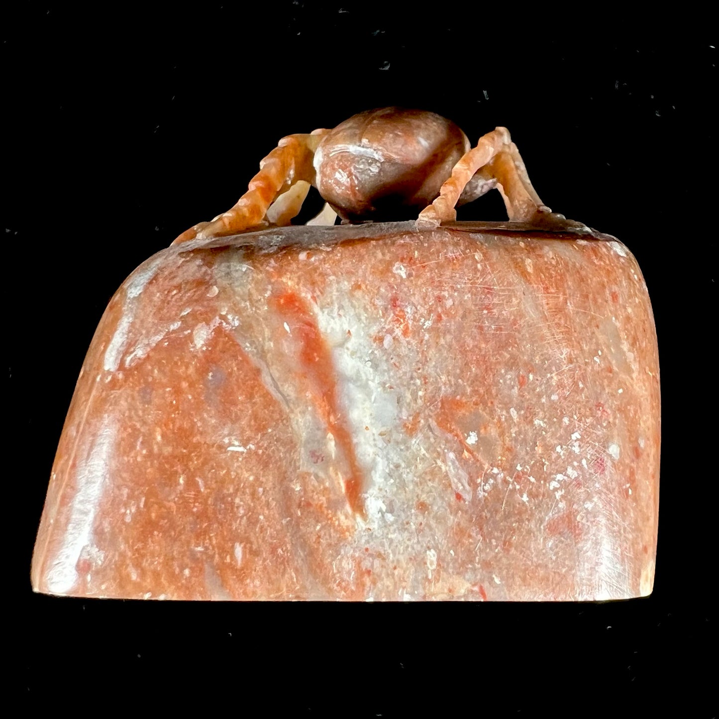 A stone Palo Verde beetle carved from brown jasper.