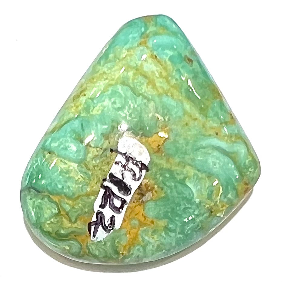 A loose green turquoise stone from Royston District, Nevada.