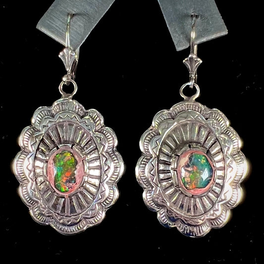 A pair of handmade sterling silver cantera opal earrings.  The earrings are Navajo style by artist Sam Yah.