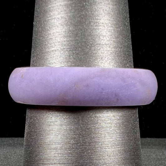 A carved lavender jade stone band.