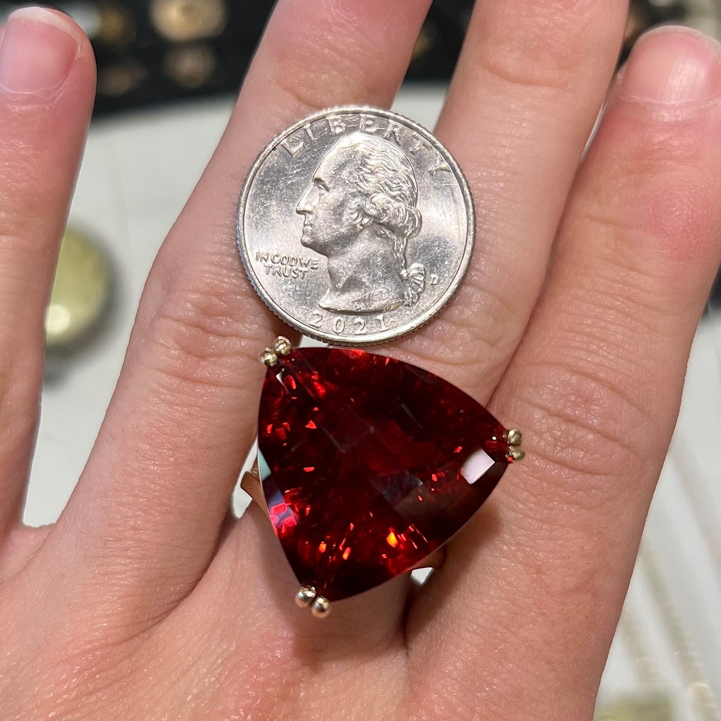 A ladies' trillion cut madeira citrine cocktail ring handmade in yellow gold.