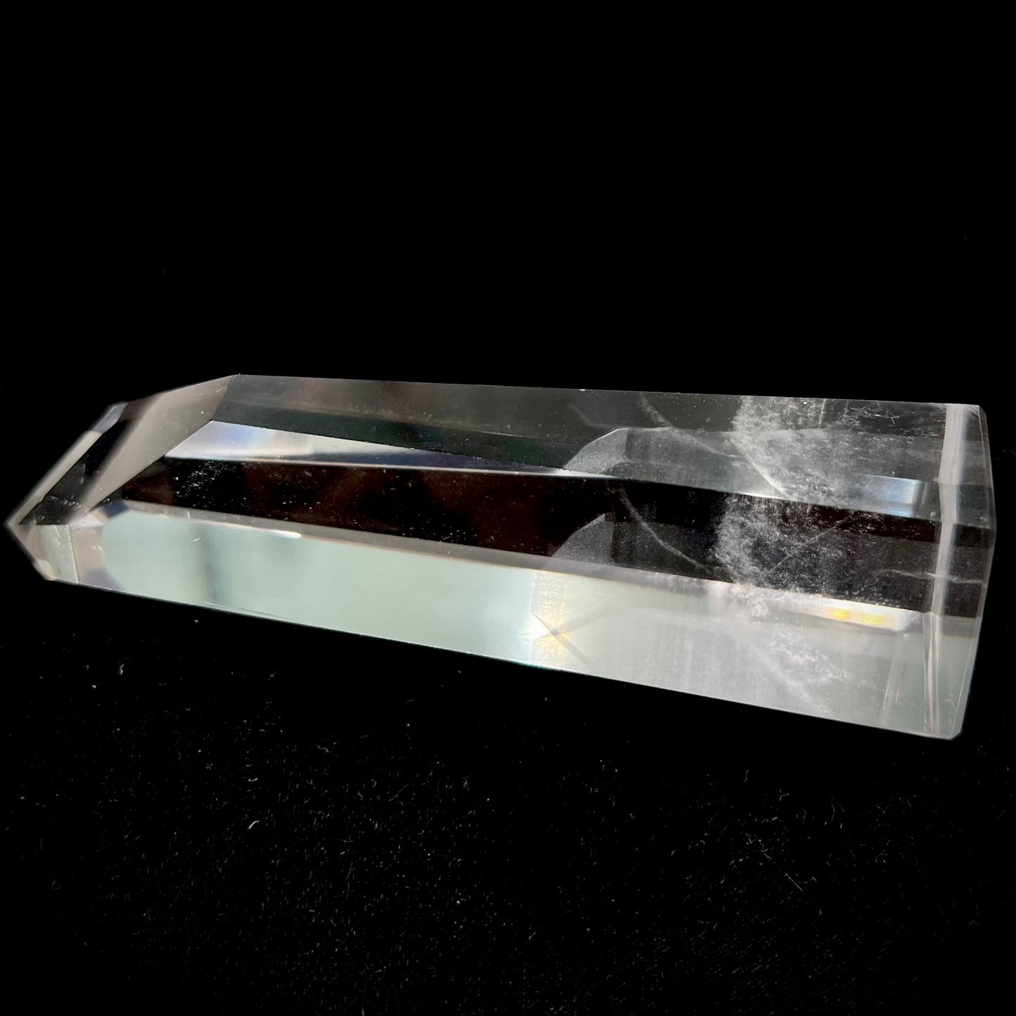 A 5.5 inch clear quartz crystal with a tabular quartz phantom inclusion.