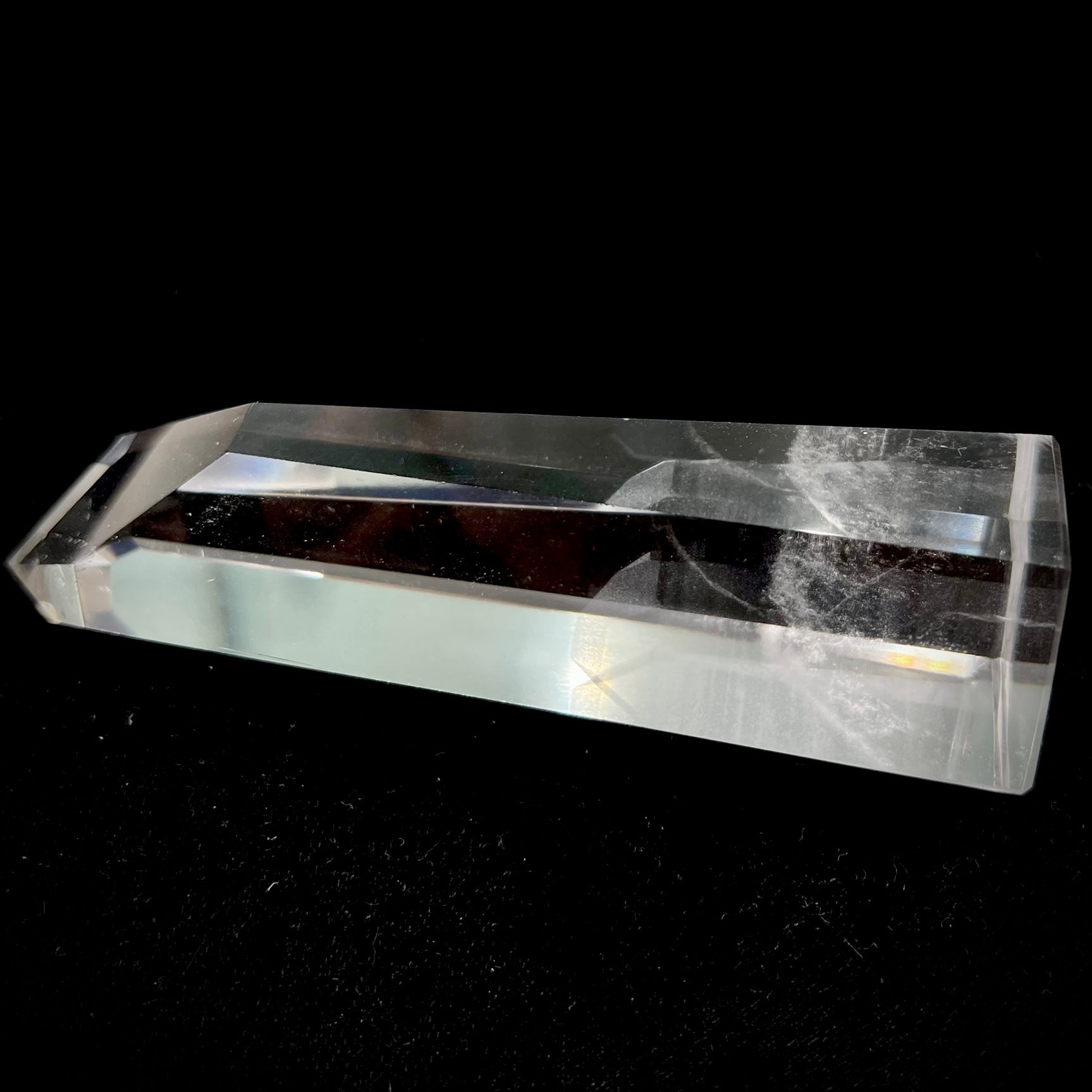A 5.5 inch clear quartz crystal with a tabular quartz phantom inclusion.