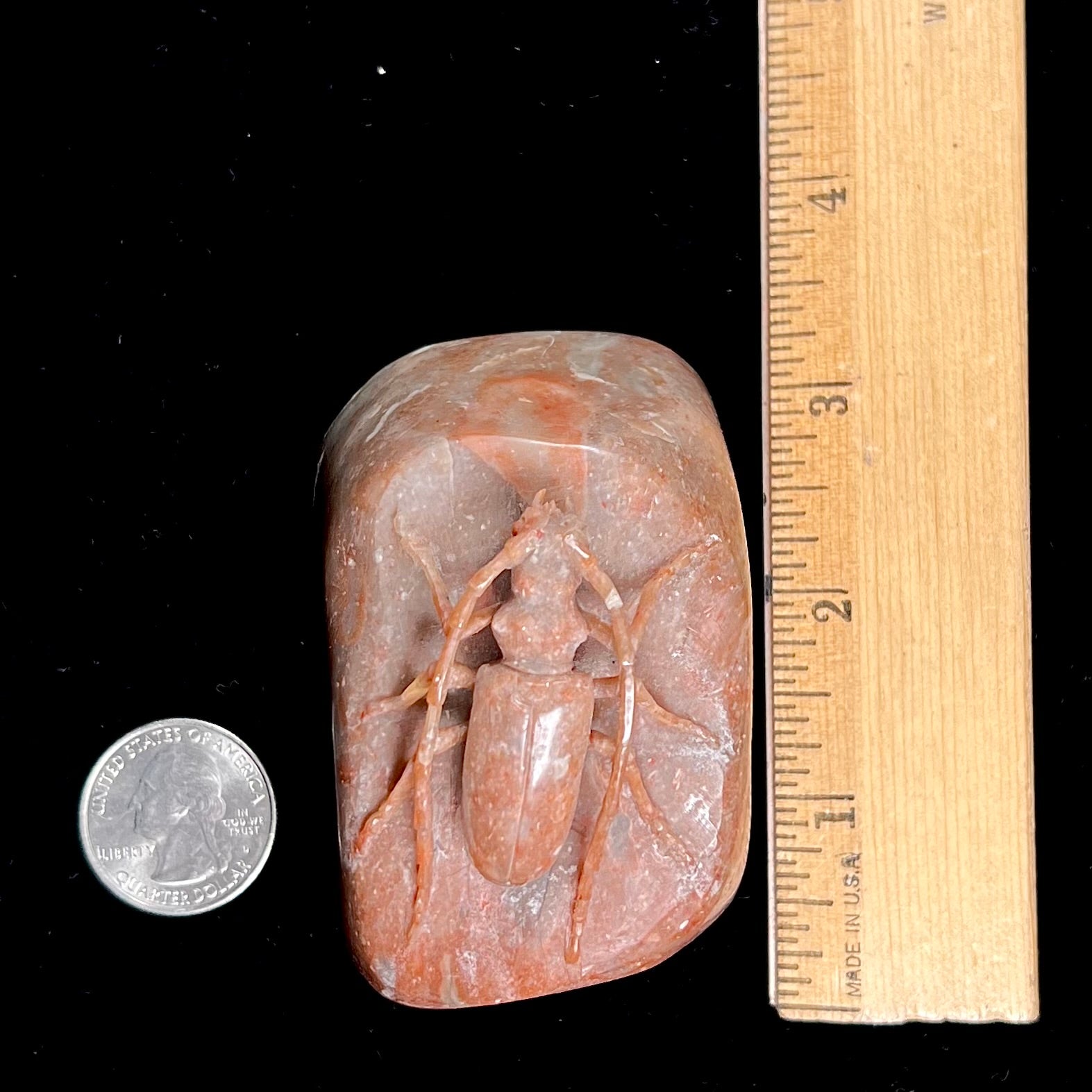 A stone Palo Verde beetle carved from brown jasper.