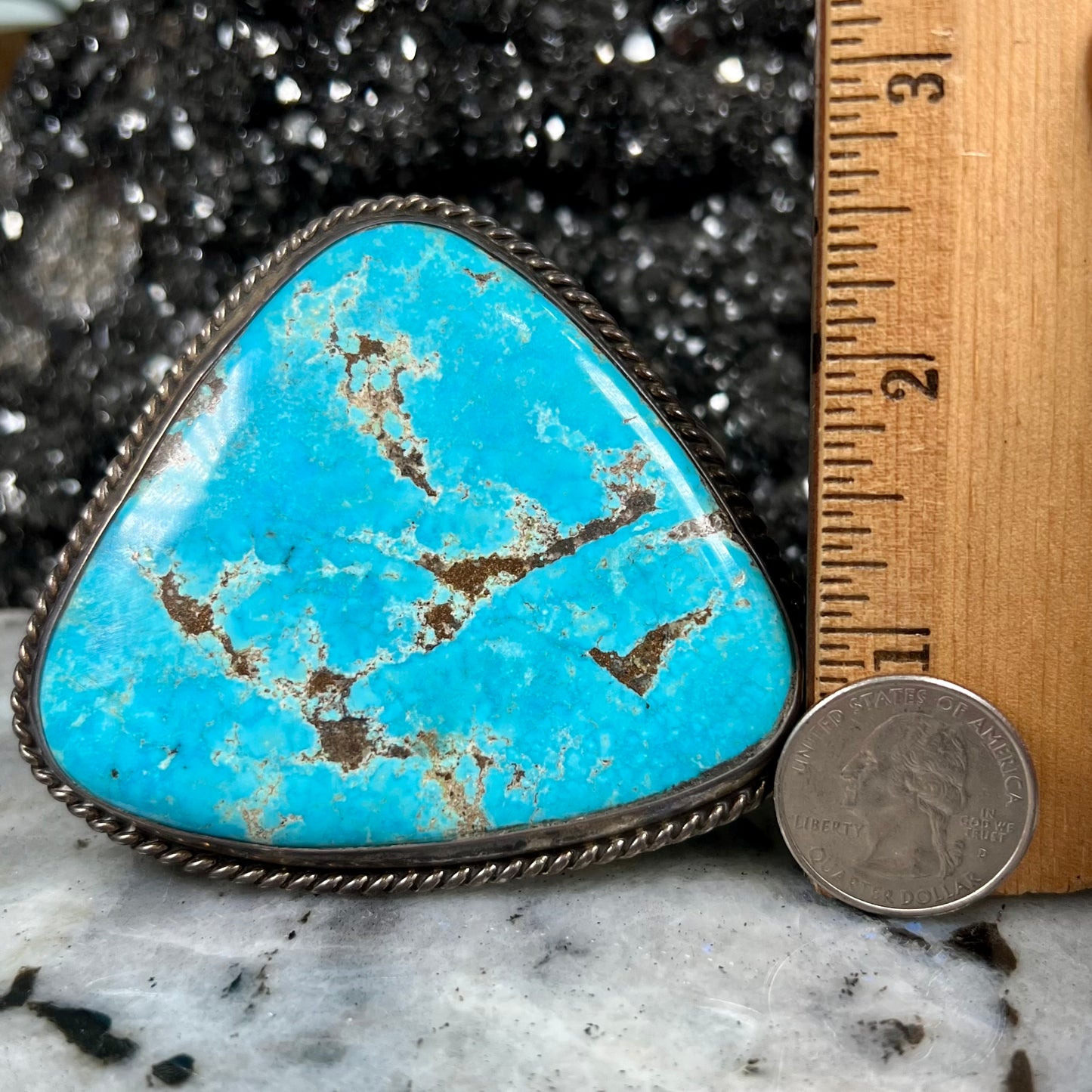 A sterling silver Morenci turquoise cuff bracelet.  The turquoise is large and has orange copper veins.