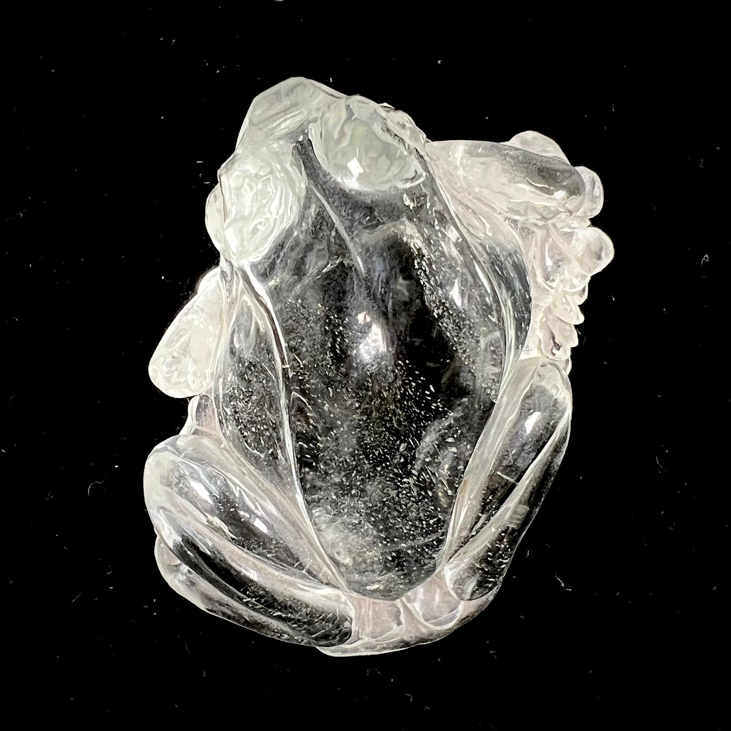 A crystal frog carved from topaz by artist Ronald Stevens.