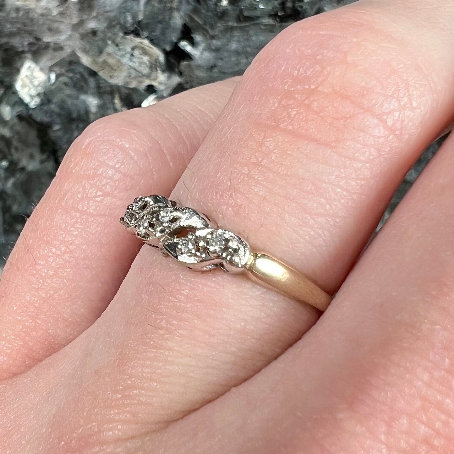 A vintage two tone diamond band set with single cut diamonds.