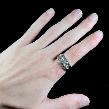 A men's estate white gold five stone diamond ring.