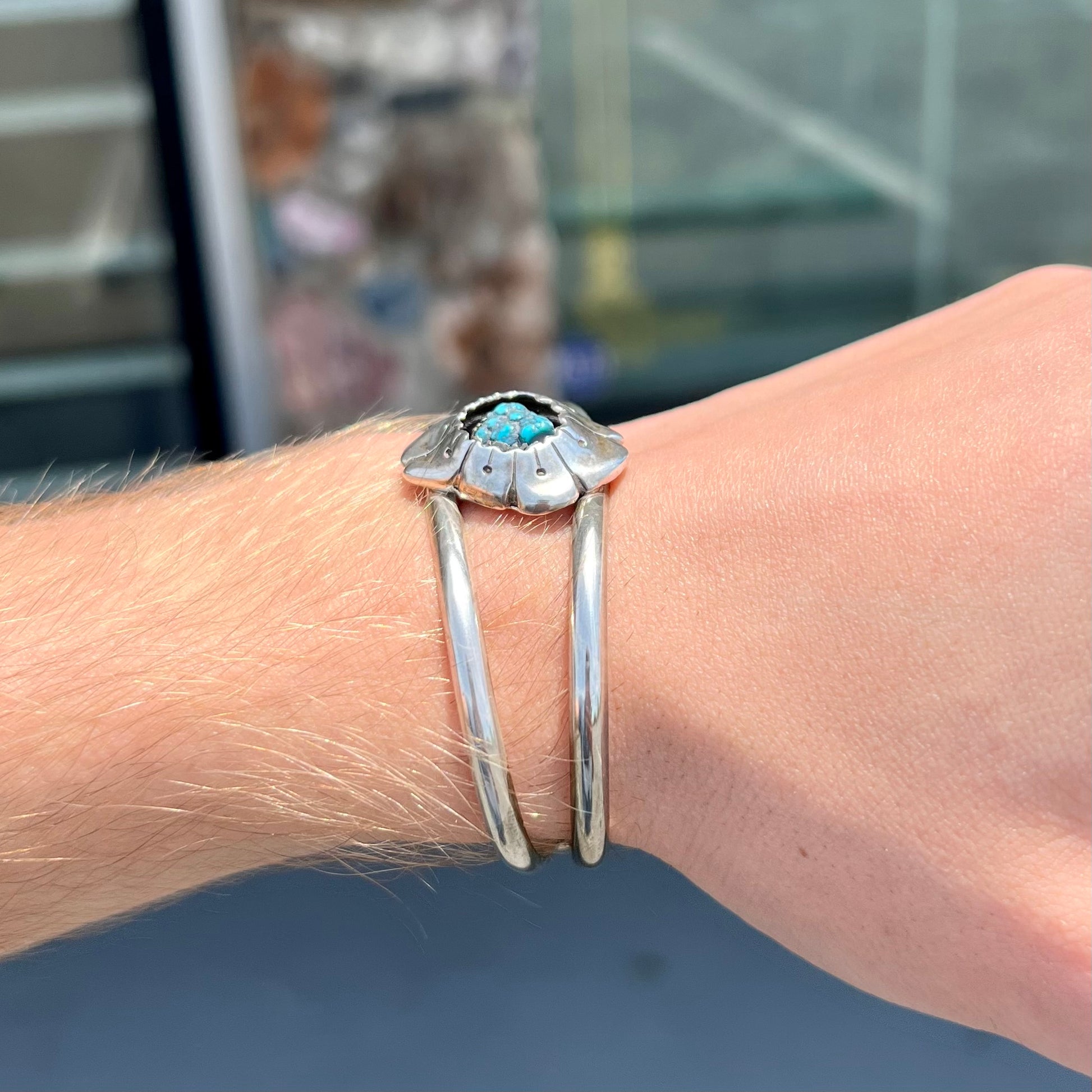 A Navajo style rough turquoise nugget silver cuff bracelet.