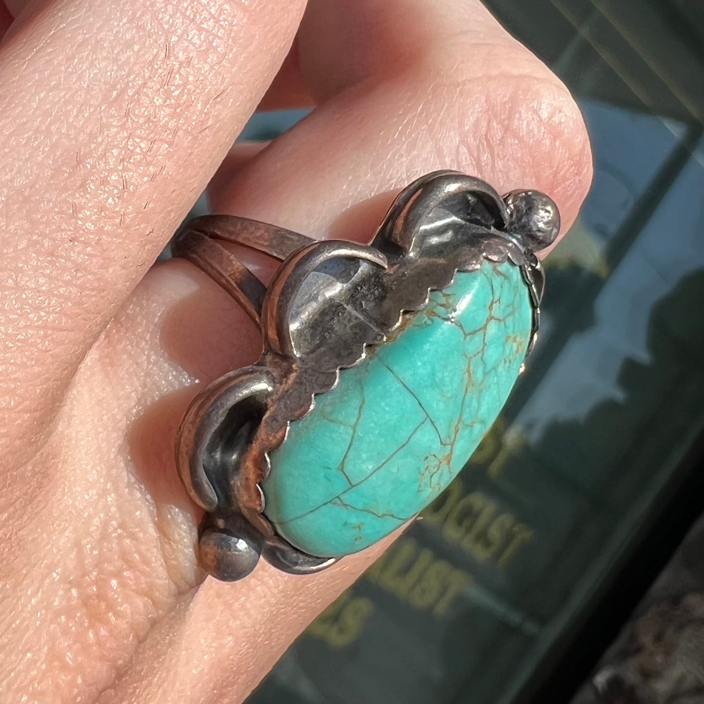 An estate sterling silver turquoise ring.  The ring was handmade by Navajo artist, Roy Buck.