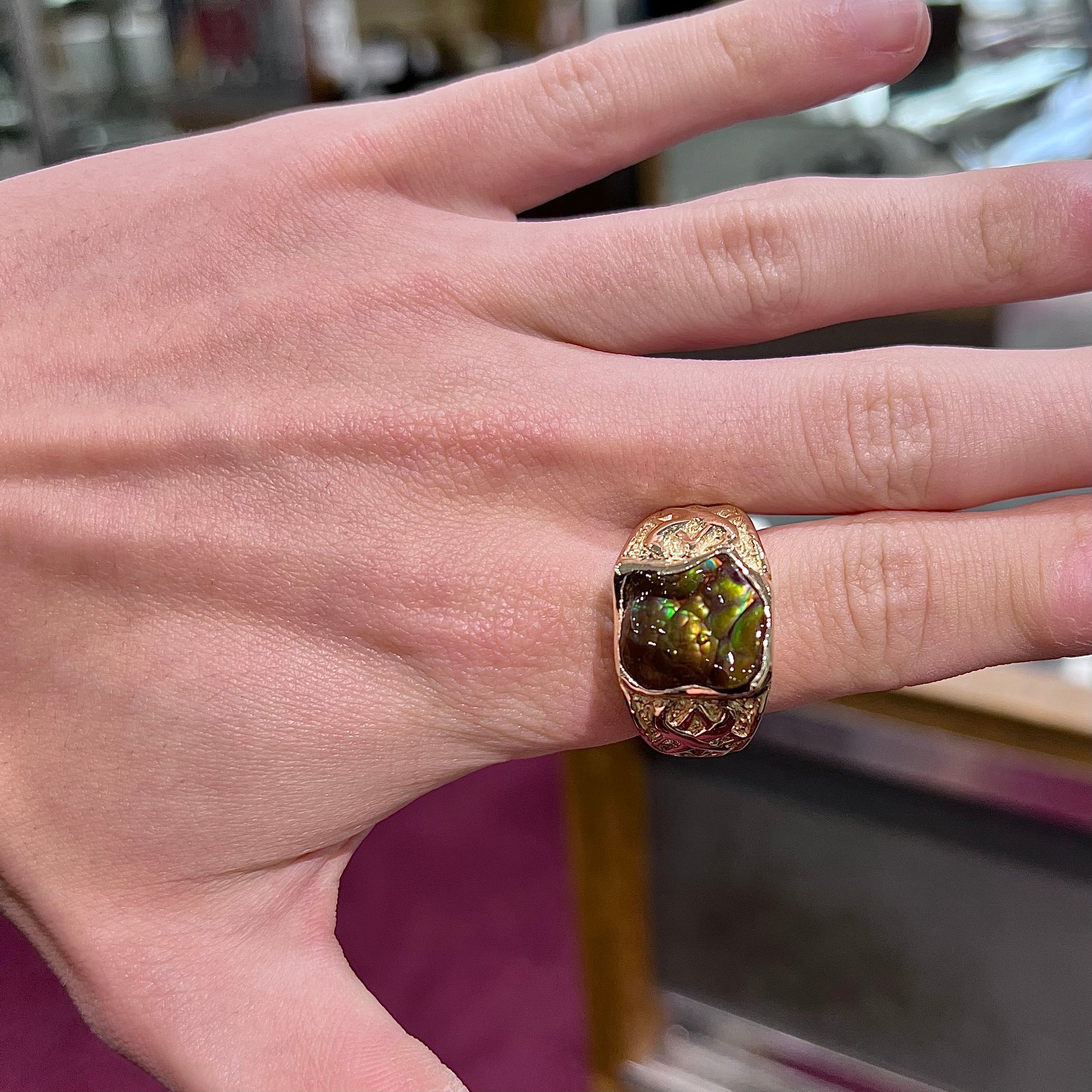 Custom, heavy yellow gold men's ring set with fire agate from Deer Creek, Arizona.