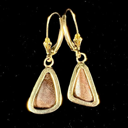 A pair of Australian boulder opal dangle earrings.