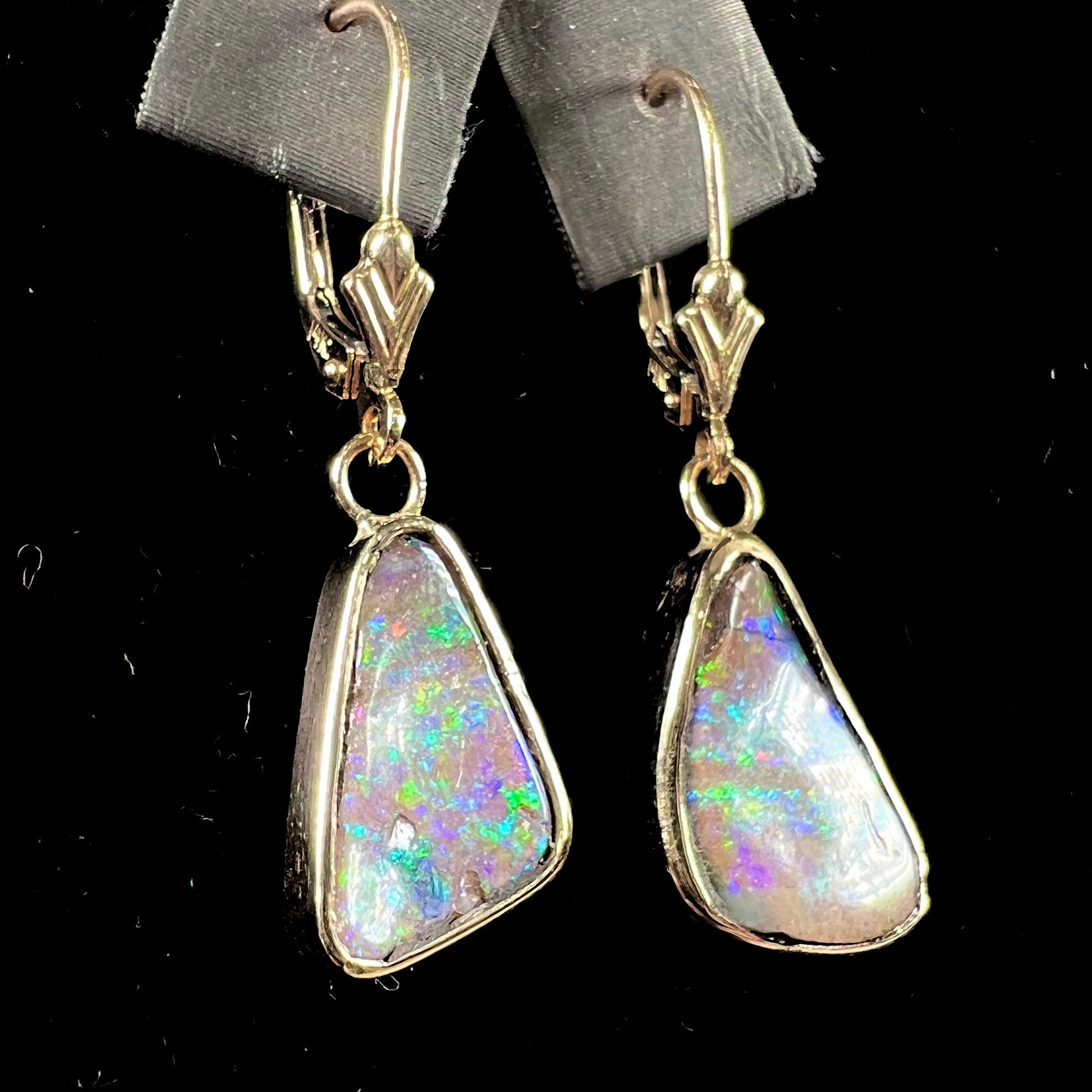 A pair of Australian boulder opal dangle earrings.