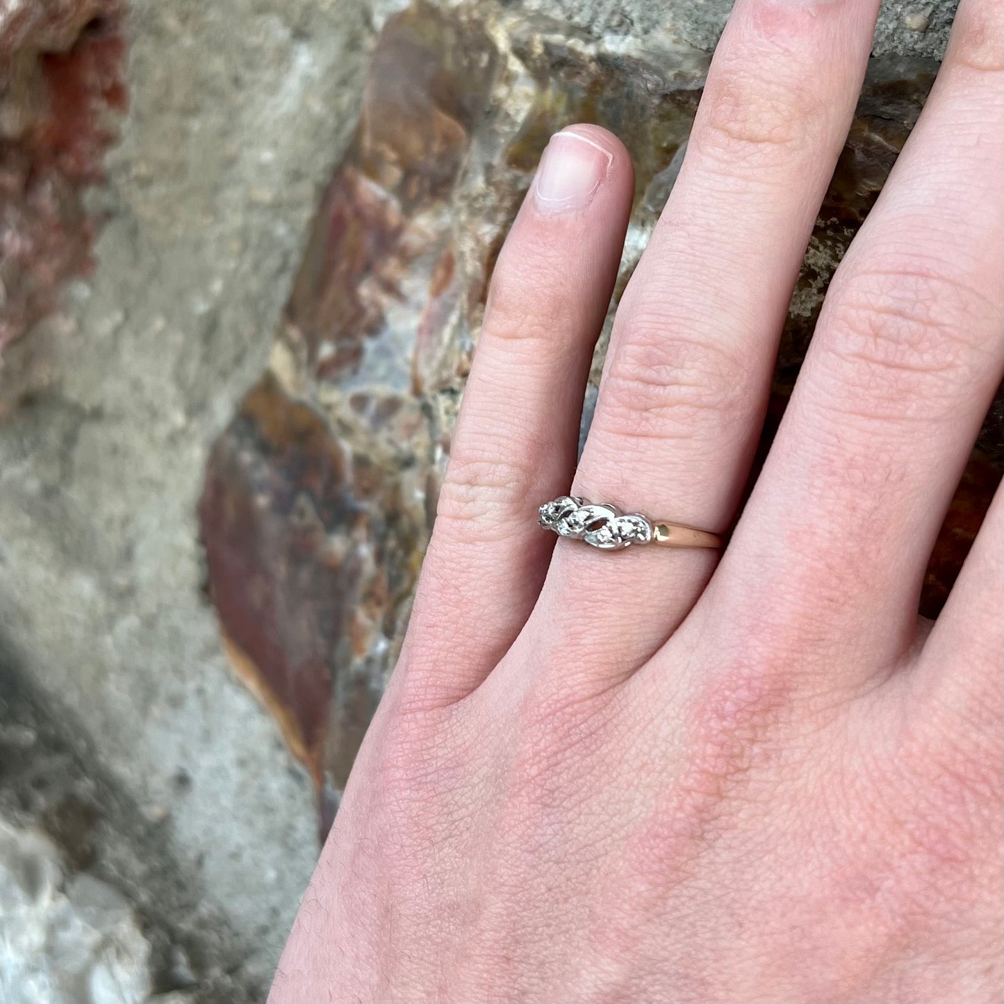 A vintage two tone diamond band set with single cut diamonds.