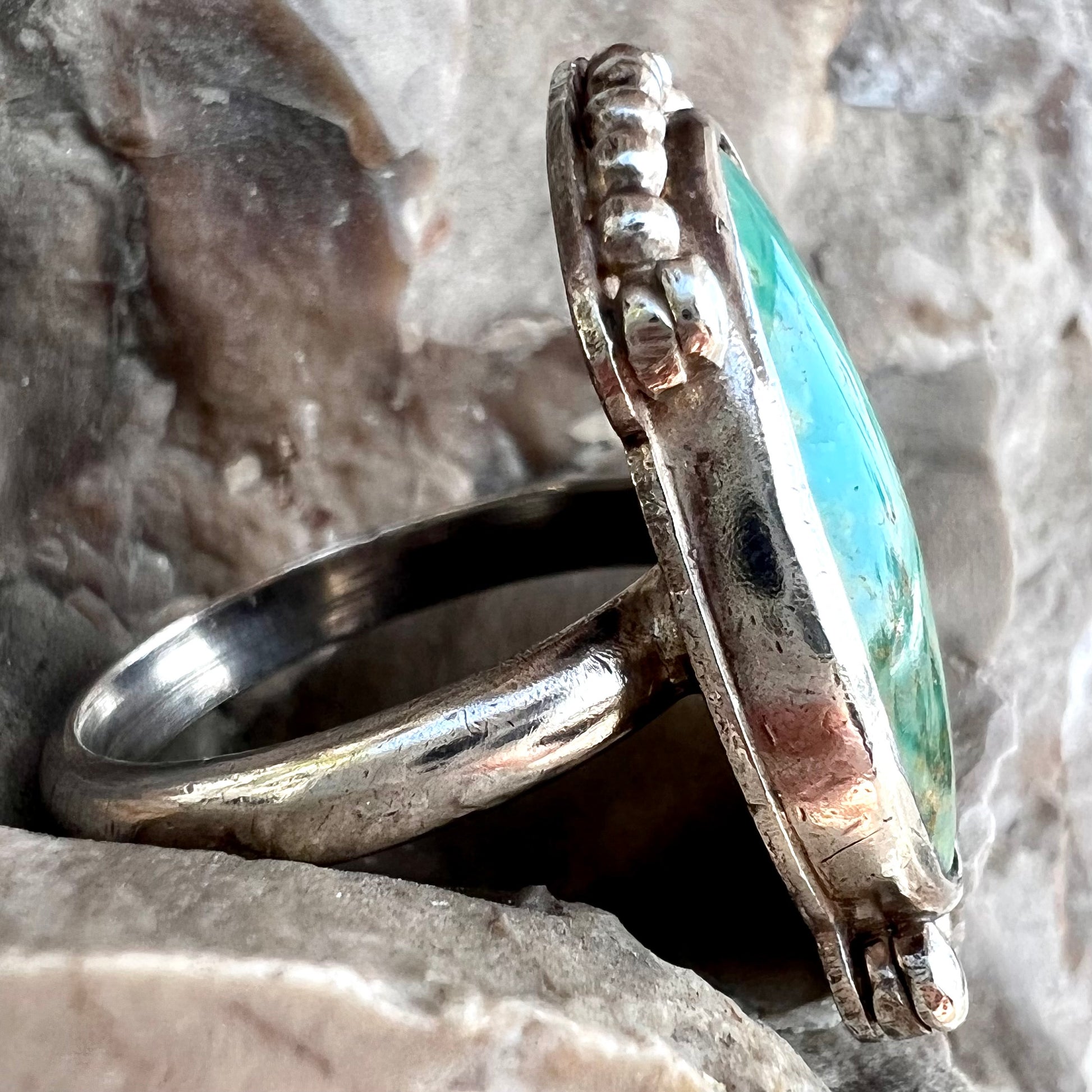A sterling silver, Native American style green turquoise ring.  The turquoise is from the Royston Mining District.