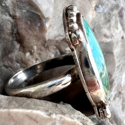 A sterling silver, Native American style green turquoise ring.  The turquoise is from the Royston Mining District.