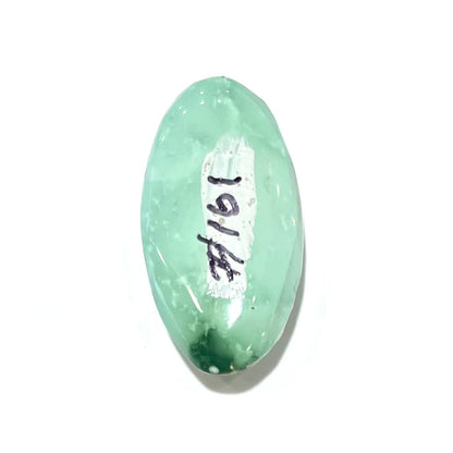 A loose, oval cabochon cut variscite stone from Utah, USA.