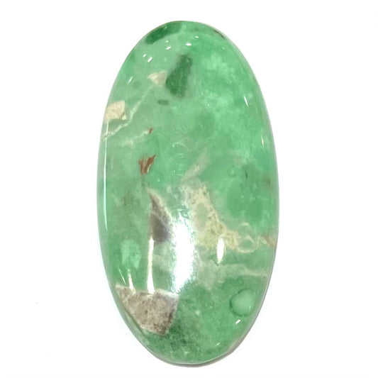 A loose, oval cabochon cut variscite stone from Utah, USA.