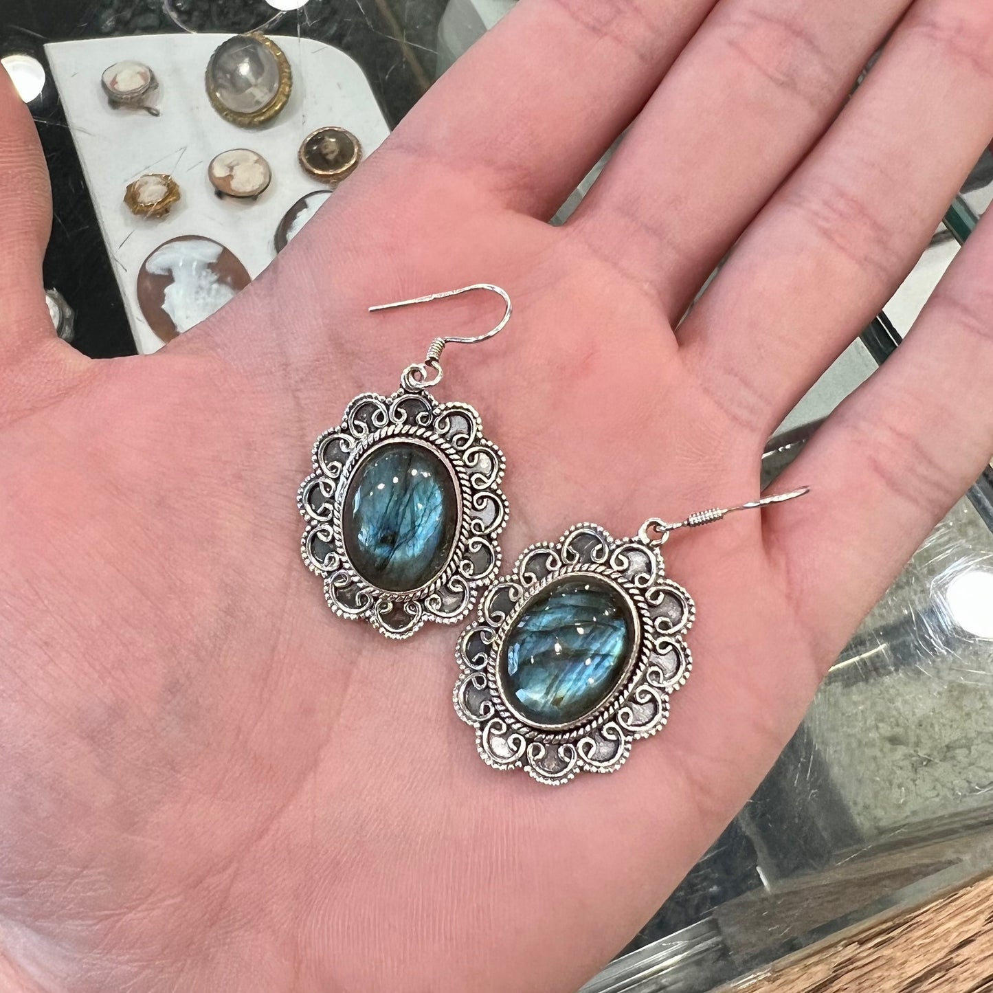 A pair of Southwest style sterling silver labradorite dangle earrings.