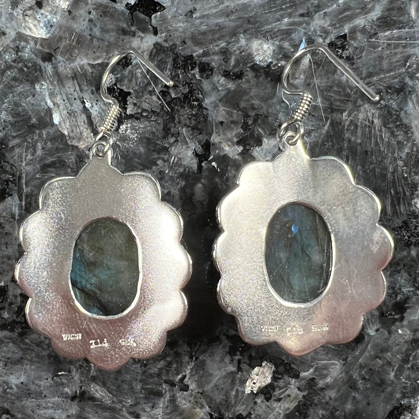 A pair of Southwest style sterling silver labradorite dangle earrings.