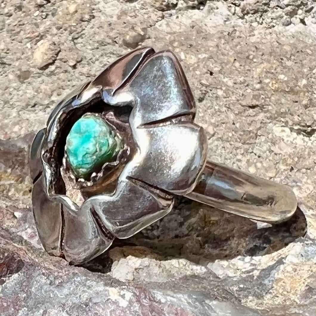 A handmade, sterling silver Native American turquoise nugget ring.