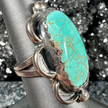 An estate sterling silver turquoise ring.  The ring was handmade by Navajo artist, Roy Buck.