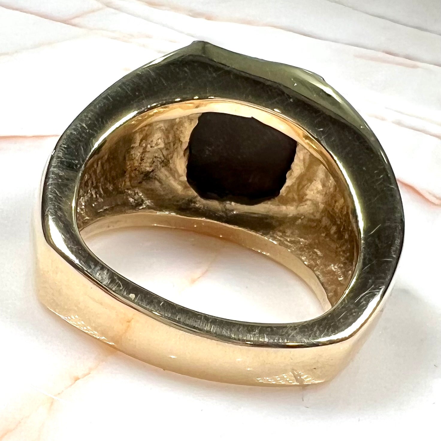 Custom, heavy yellow gold men's ring set with fire agate from Deer Creek, Arizona.