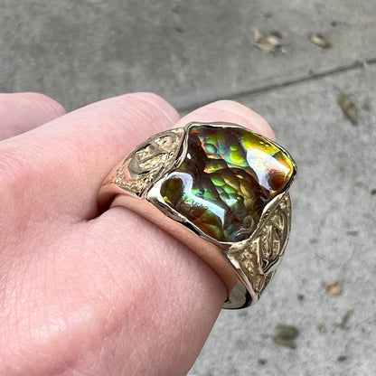 Custom, heavy yellow gold men's ring set with fire agate from Deer Creek, Arizona.