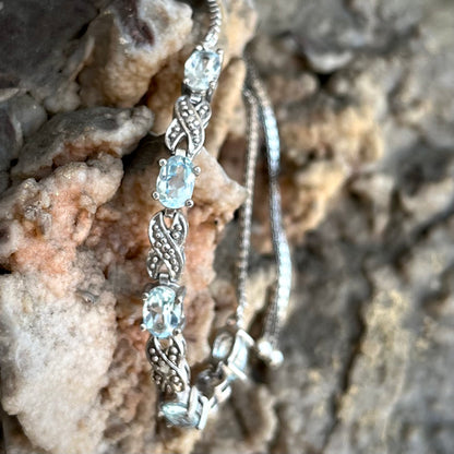 Blue Topaz Infinity Bracelet | Sterling Silver