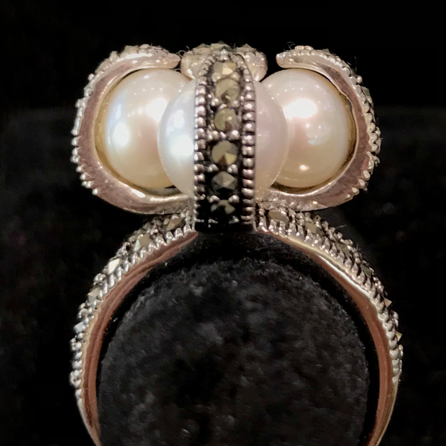 Pearl and marcasite ring set in sterling silver.