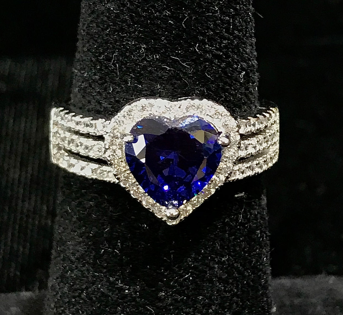 Synthetic blue heart shaped sterling silver ring.