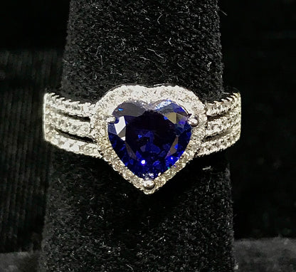 Synthetic blue heart shaped sterling silver ring.