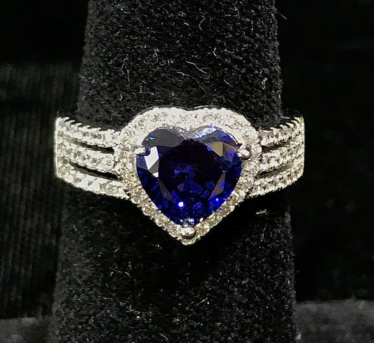 Synthetic blue heart shaped sterling silver ring.