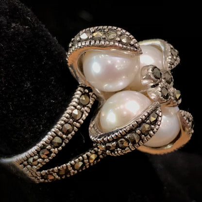 Pearl and marcasite ring set in sterling silver.