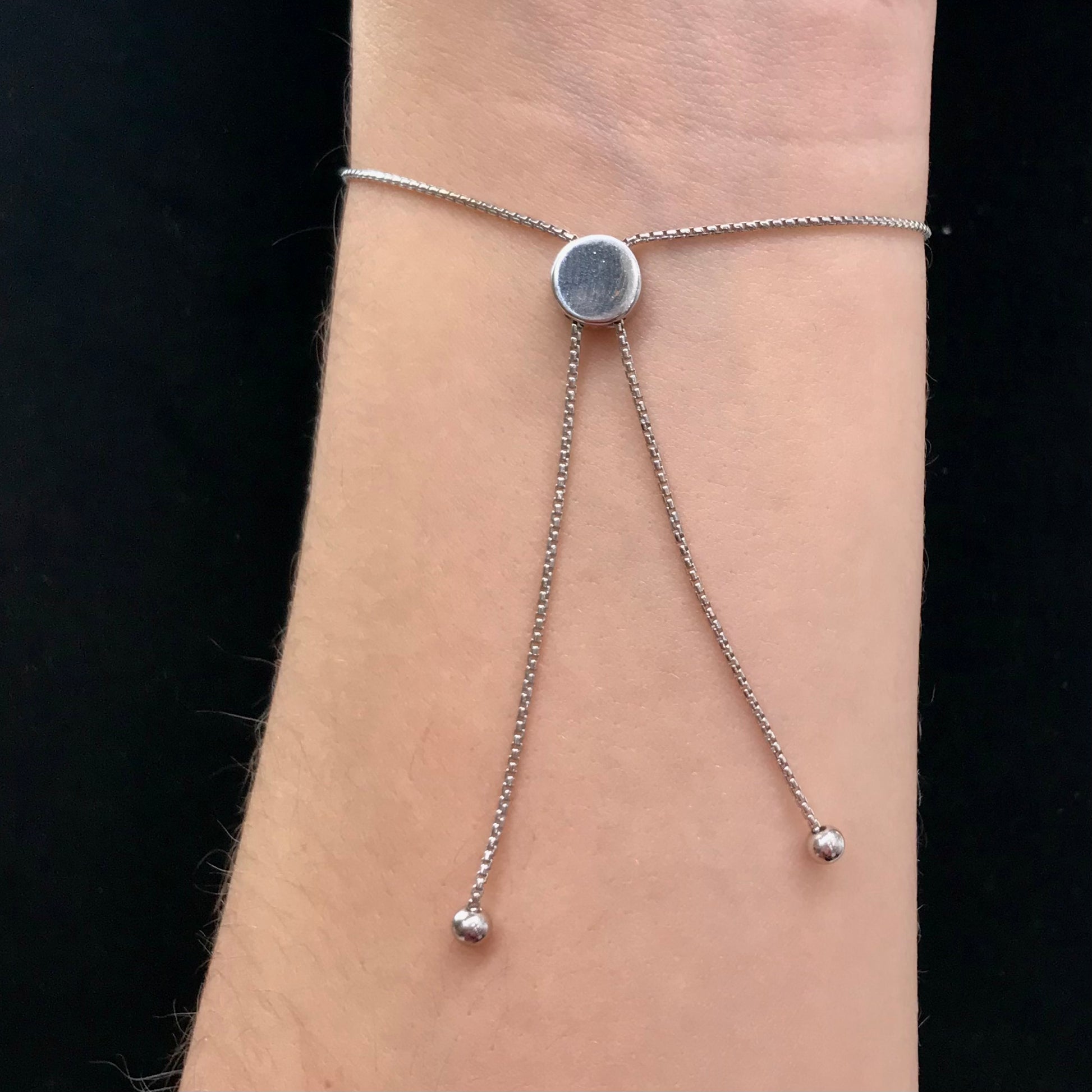 Pink dyed opal adjustable bracelet prong set in sterling silver.