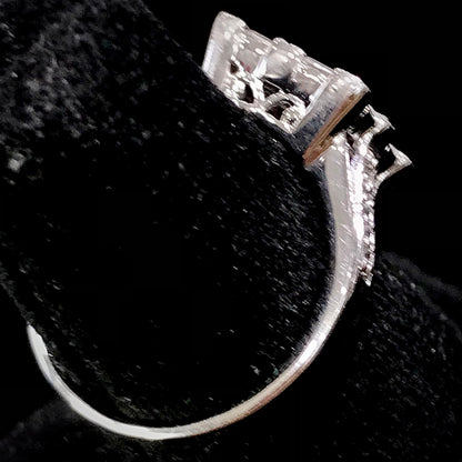 Square cubic zirconia ring set in sterling silver.