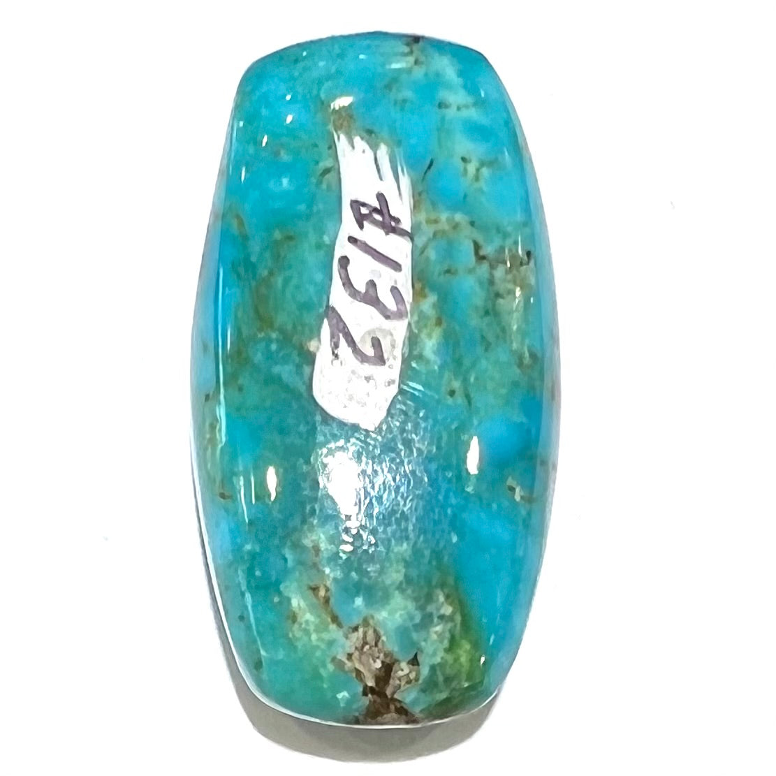 A loose, polished cabochon cut turquoise stone from Royston Mining District, Nevada.