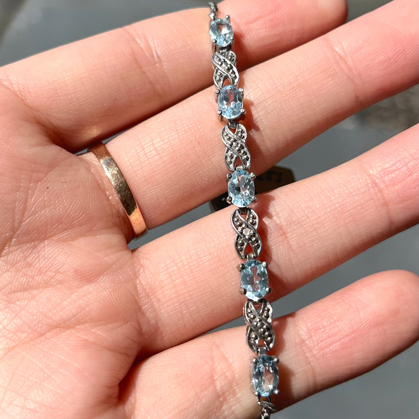 Blue Topaz Infinity Bracelet | Sterling Silver