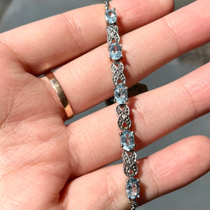Blue Topaz Infinity Bracelet | Sterling Silver