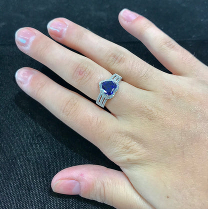 Synthetic blue heart shaped sterling silver ring.