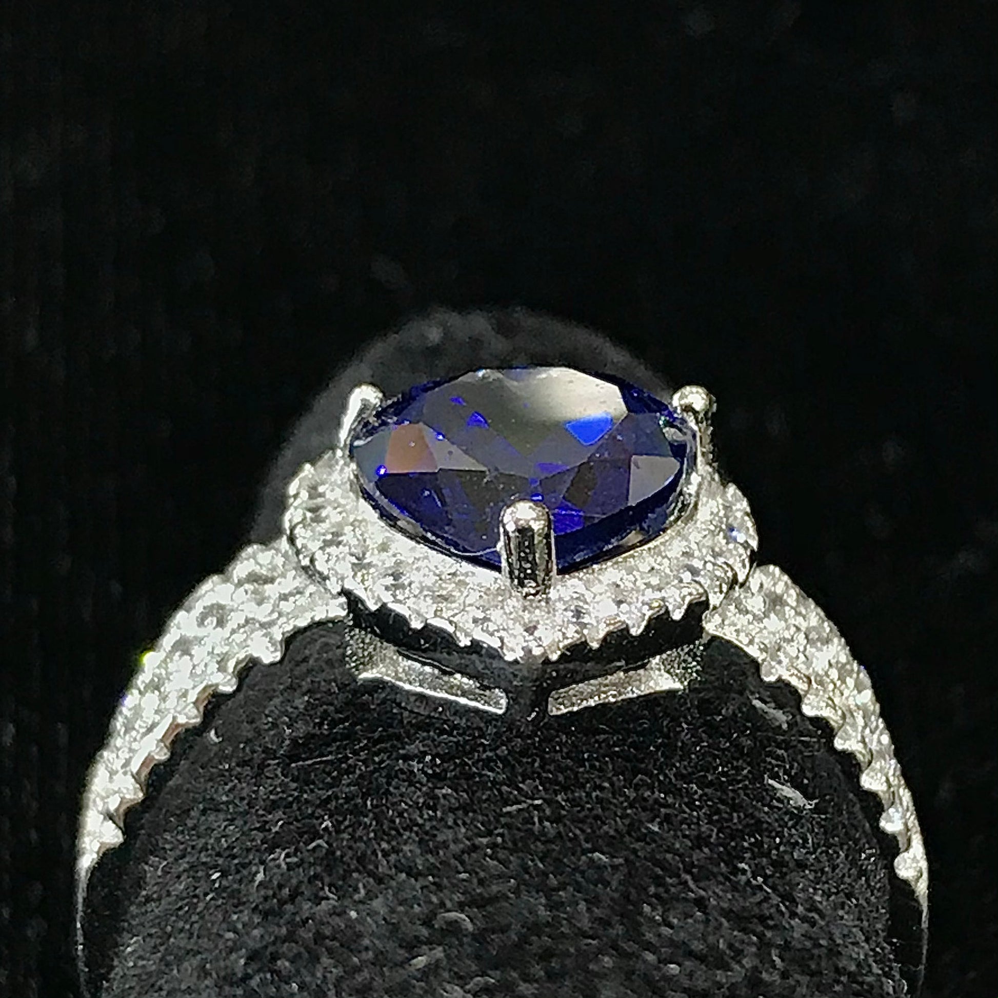 Synthetic blue heart shaped sterling silver ring.