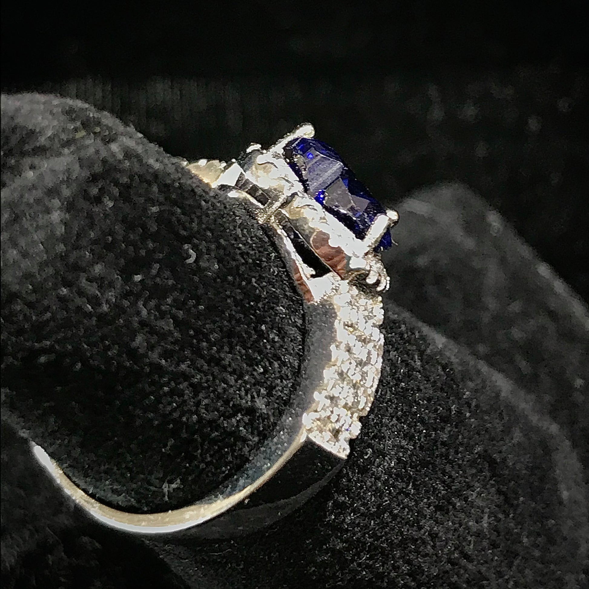 Synthetic blue heart shaped sterling silver ring.