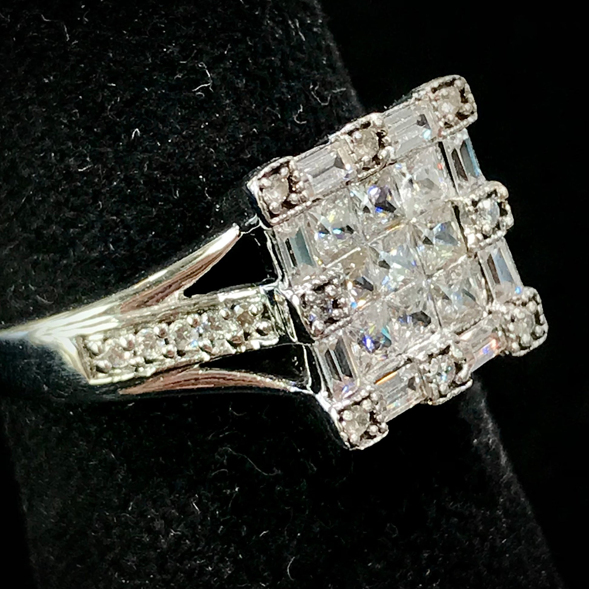 Square cubic zirconia ring set in sterling silver.
