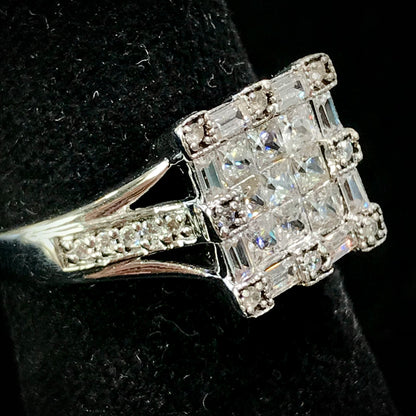 Square cubic zirconia ring set in sterling silver.