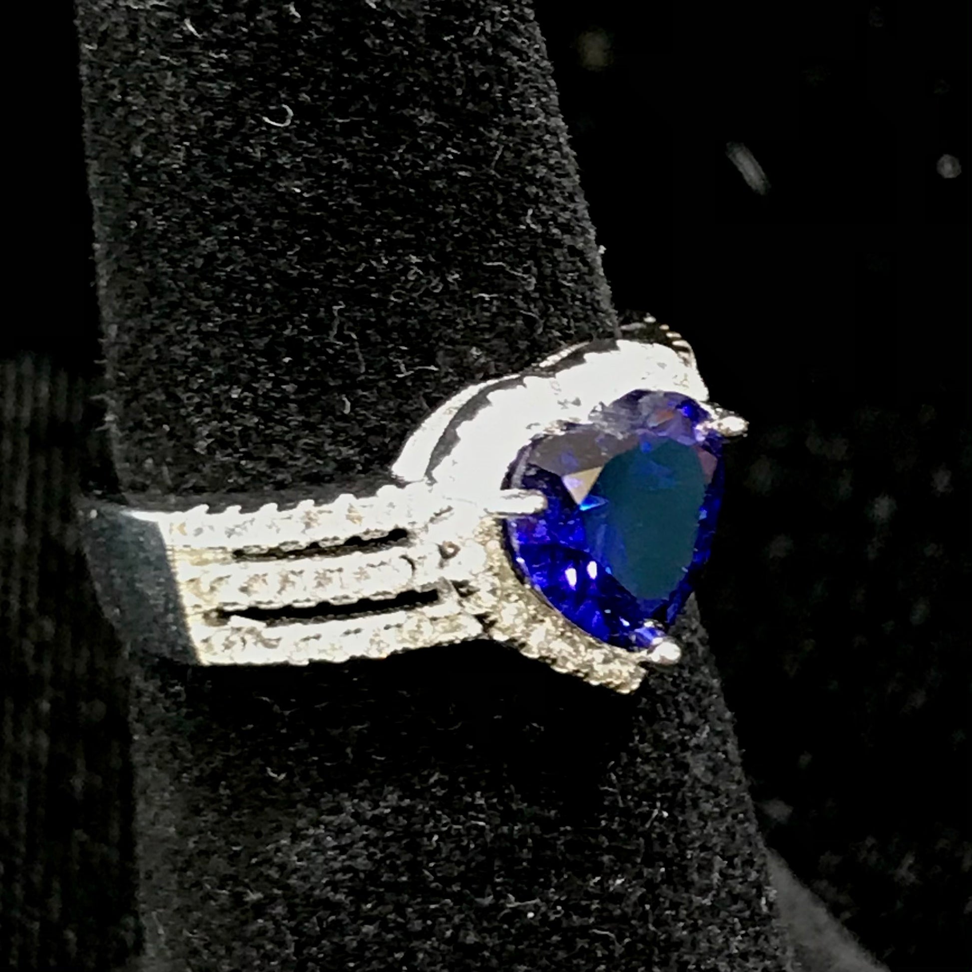 Synthetic blue heart shaped sterling silver ring.