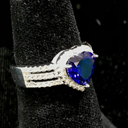 Synthetic blue heart shaped sterling silver ring.