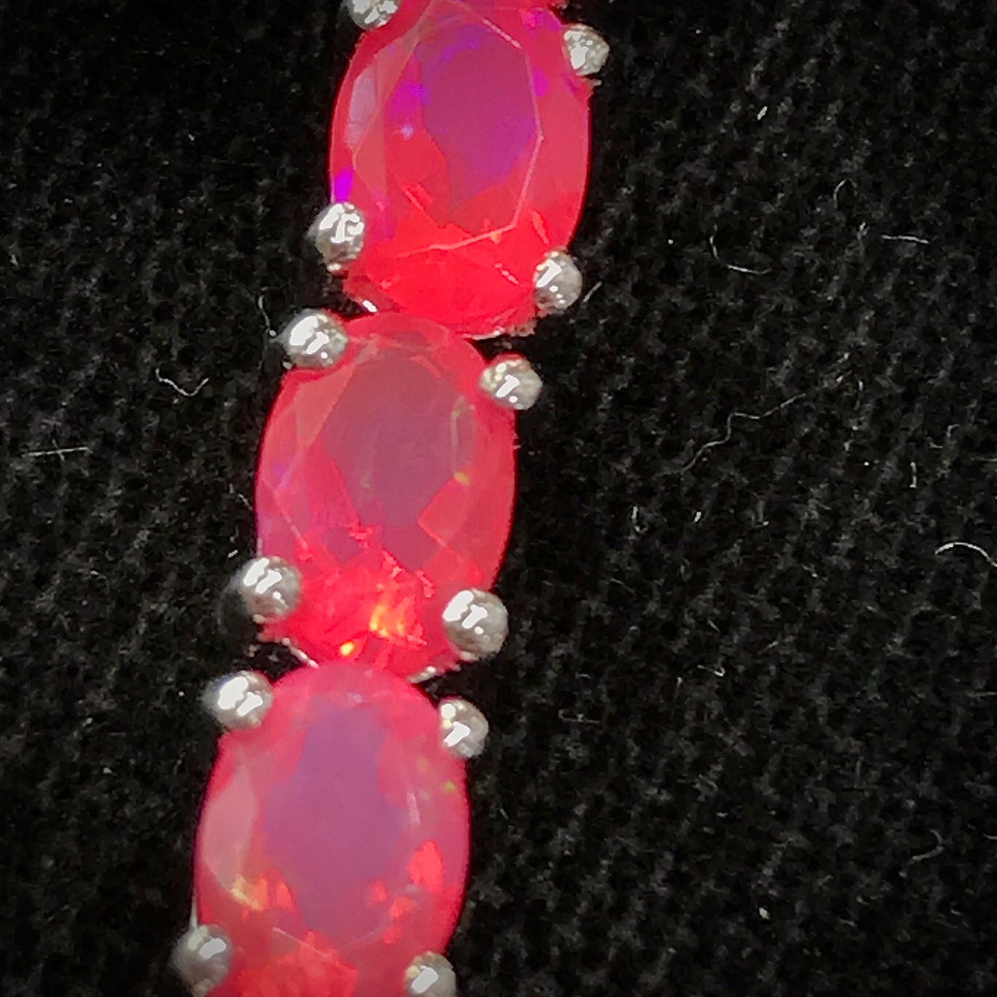 Pink dyed opal adjustable bracelet prong set in sterling silver.